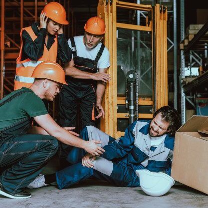 young-warehouse-worker-injured-leg-workplace_99043-677
